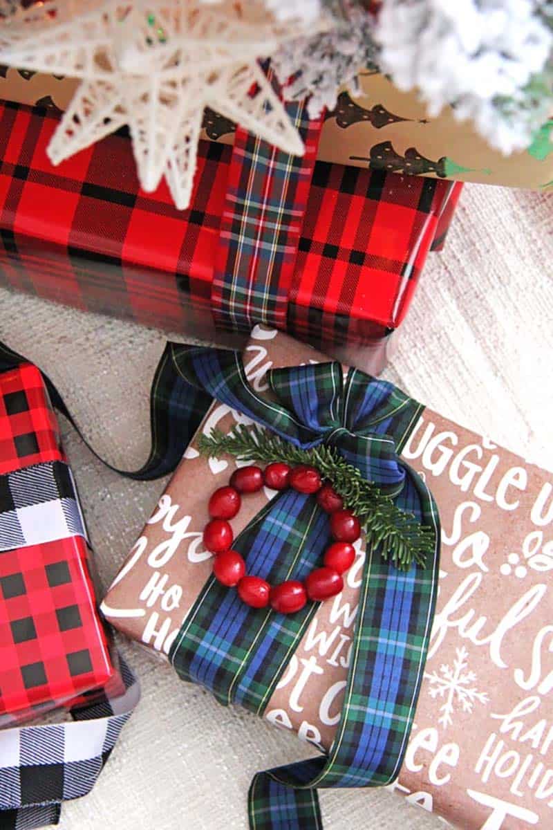 festive gift wrap with plaid and homemade ornaments
