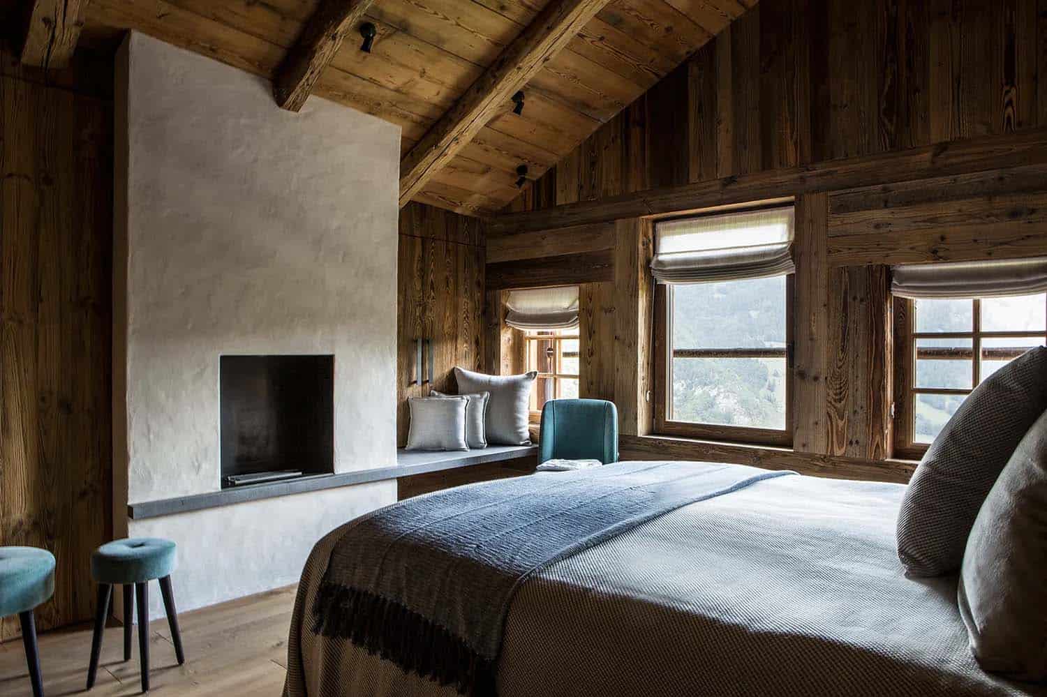 rustic modern bedroom with a fireplace