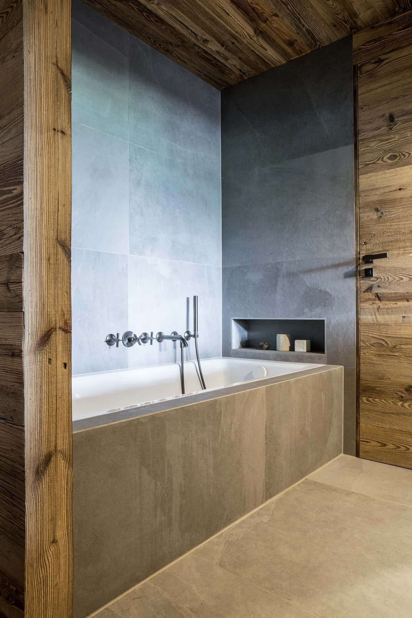 rustic modern bathroom with an integrated tub