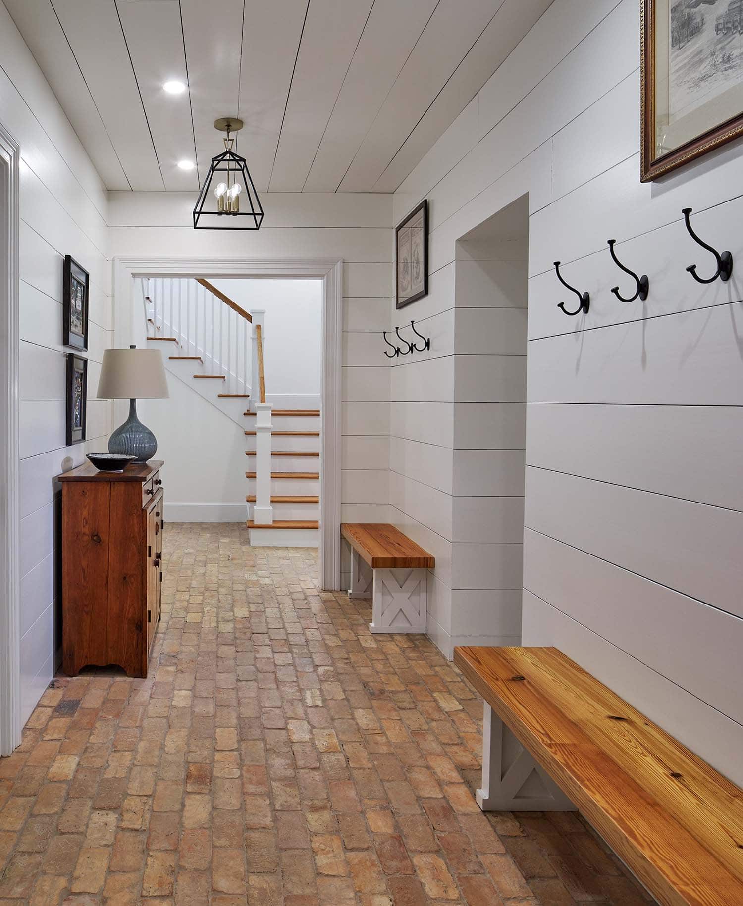 contemporary mudroom with built-in benches