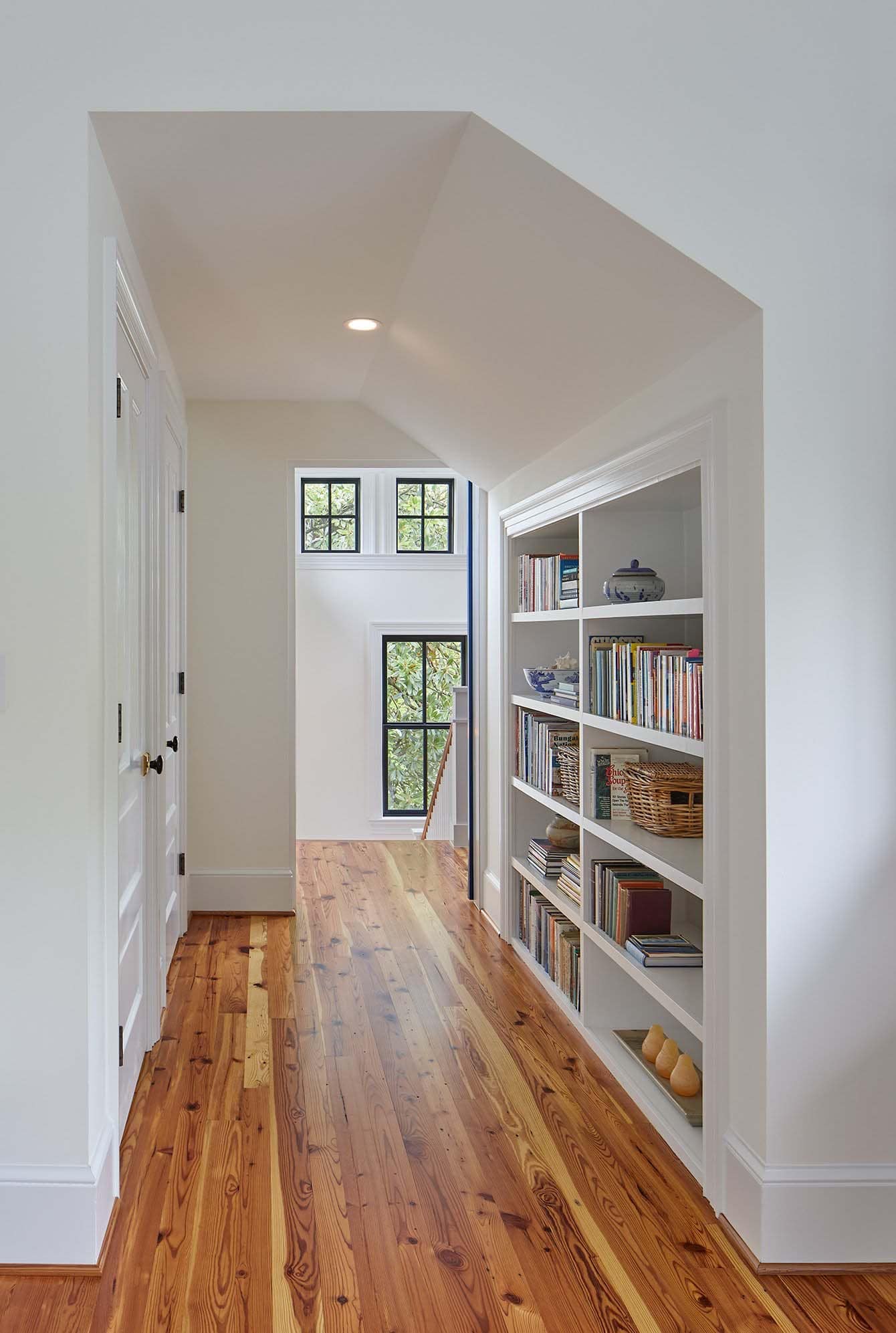 contemporary hallway with wall shelving