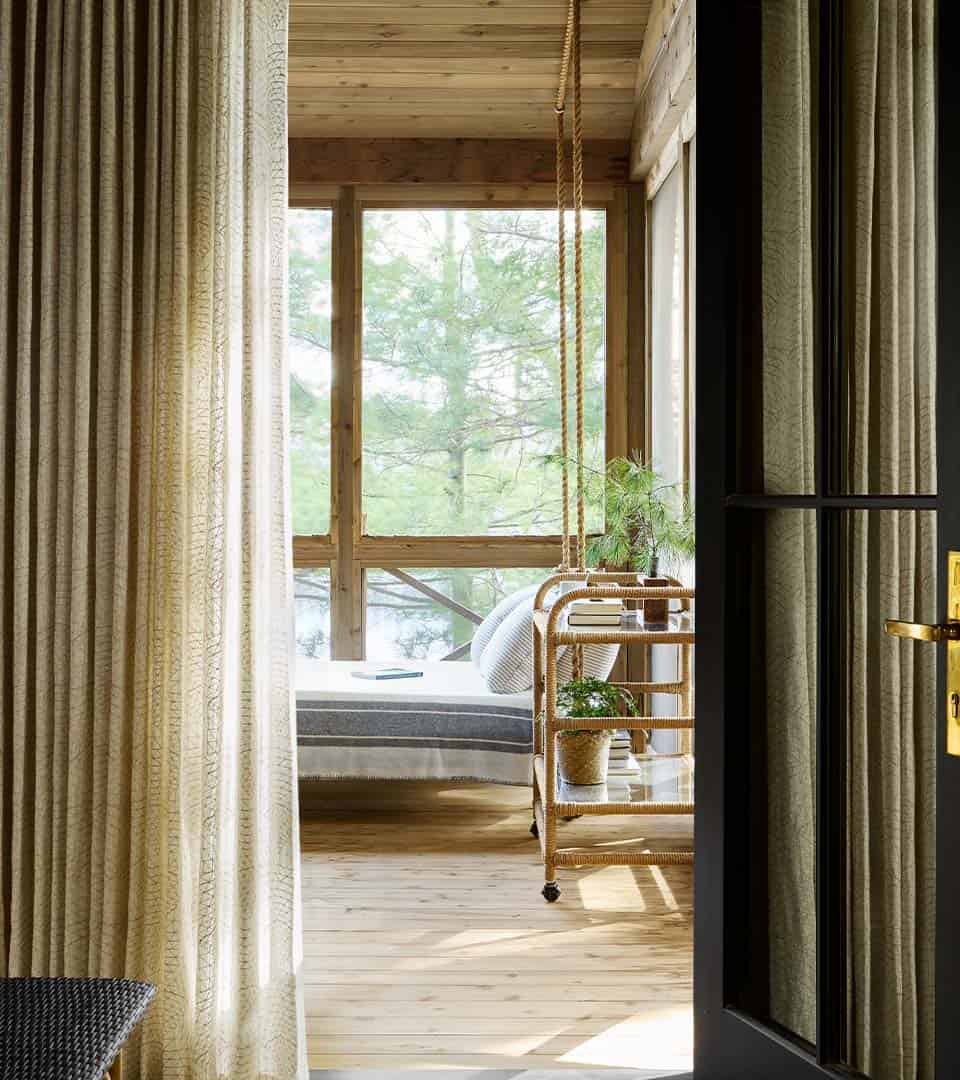 entry into a rustic screened porch