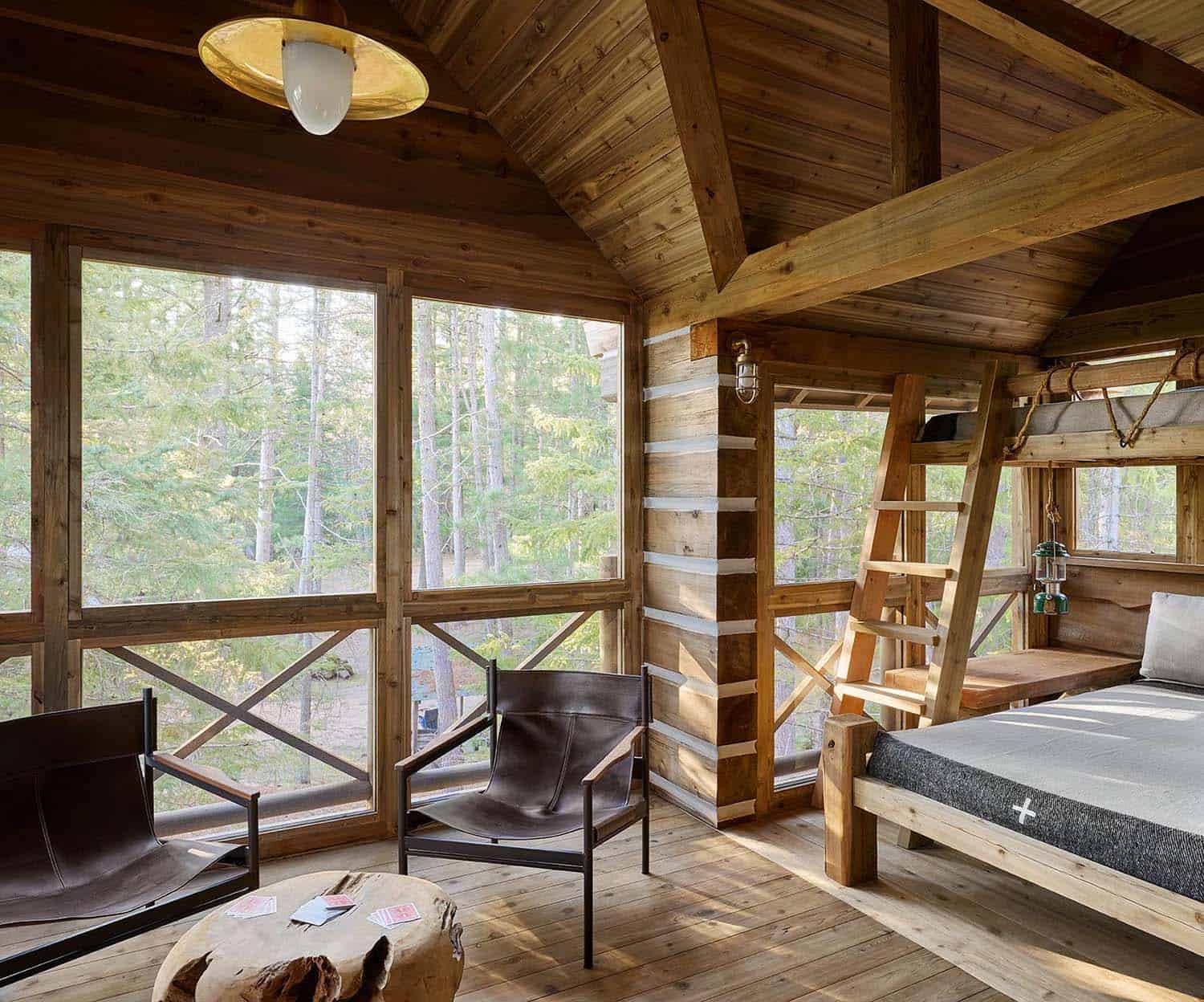 rustic screened porch with a bunk bedroom 
