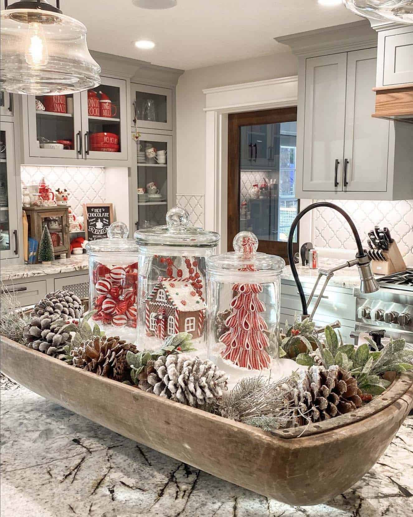 christmas decorated kitchen with a dough bowl on the countertop