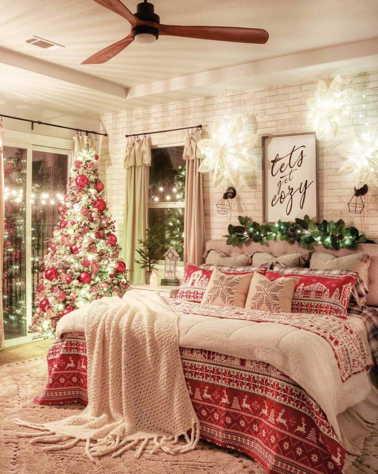 christmas decorated bedroom with a red and white theme and tree