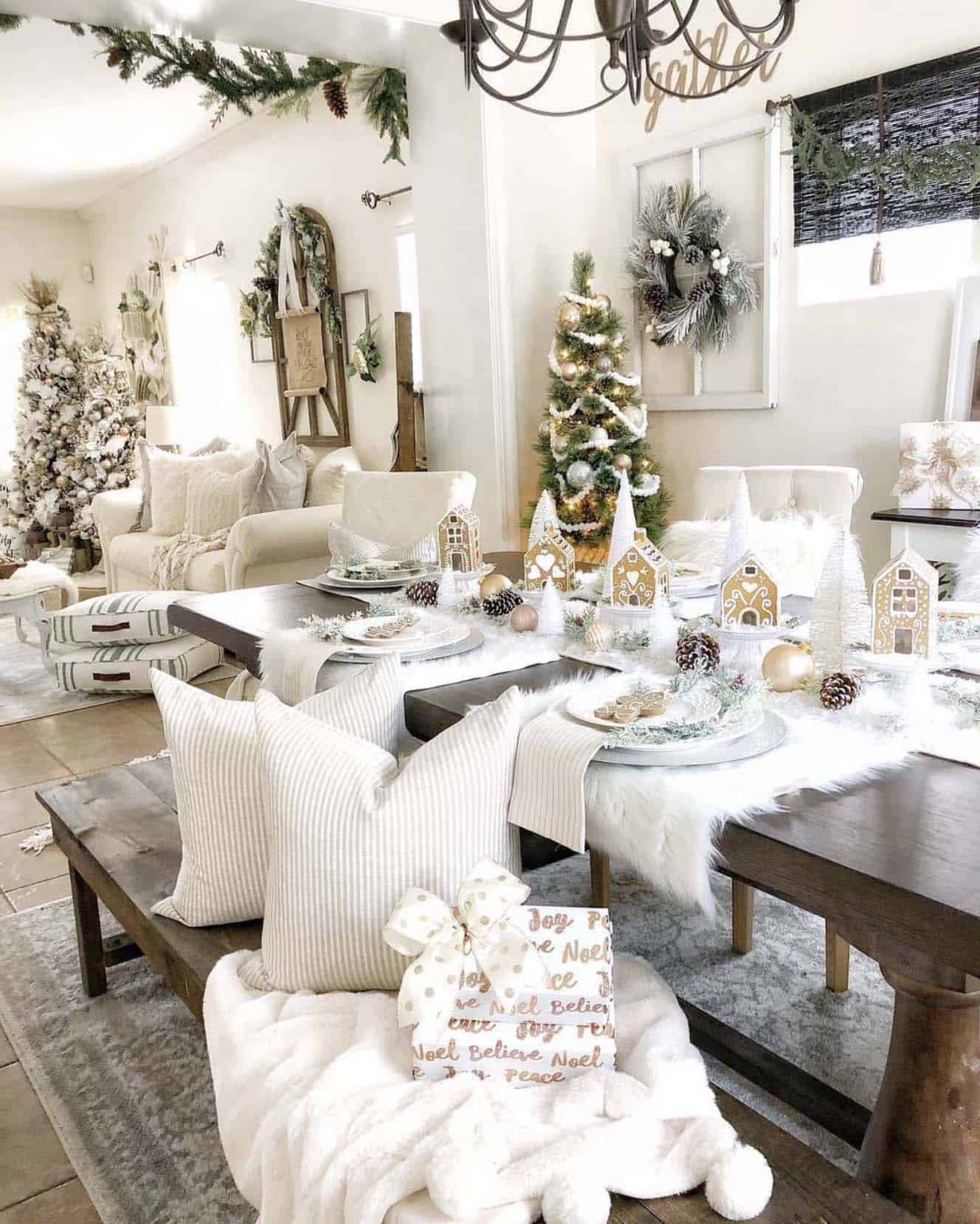 christmas decorated dining table with a winter white color palette