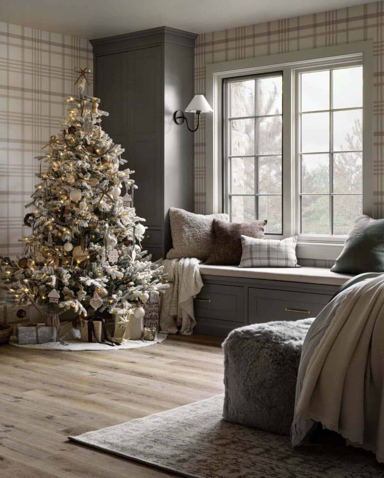 cozy living room with a christmas tree and a window seat