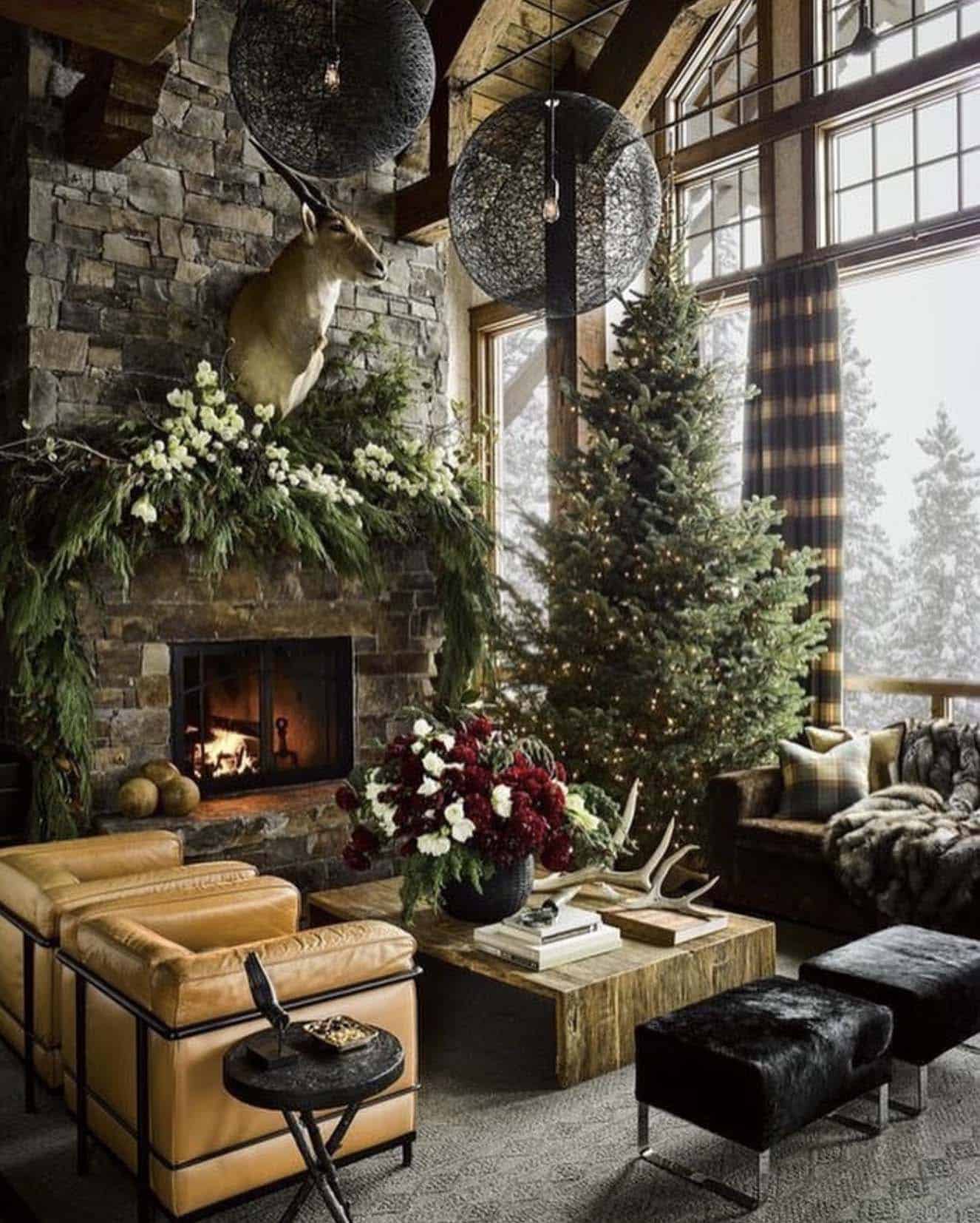 mountain house living room with a fireplace and decorated for christmas