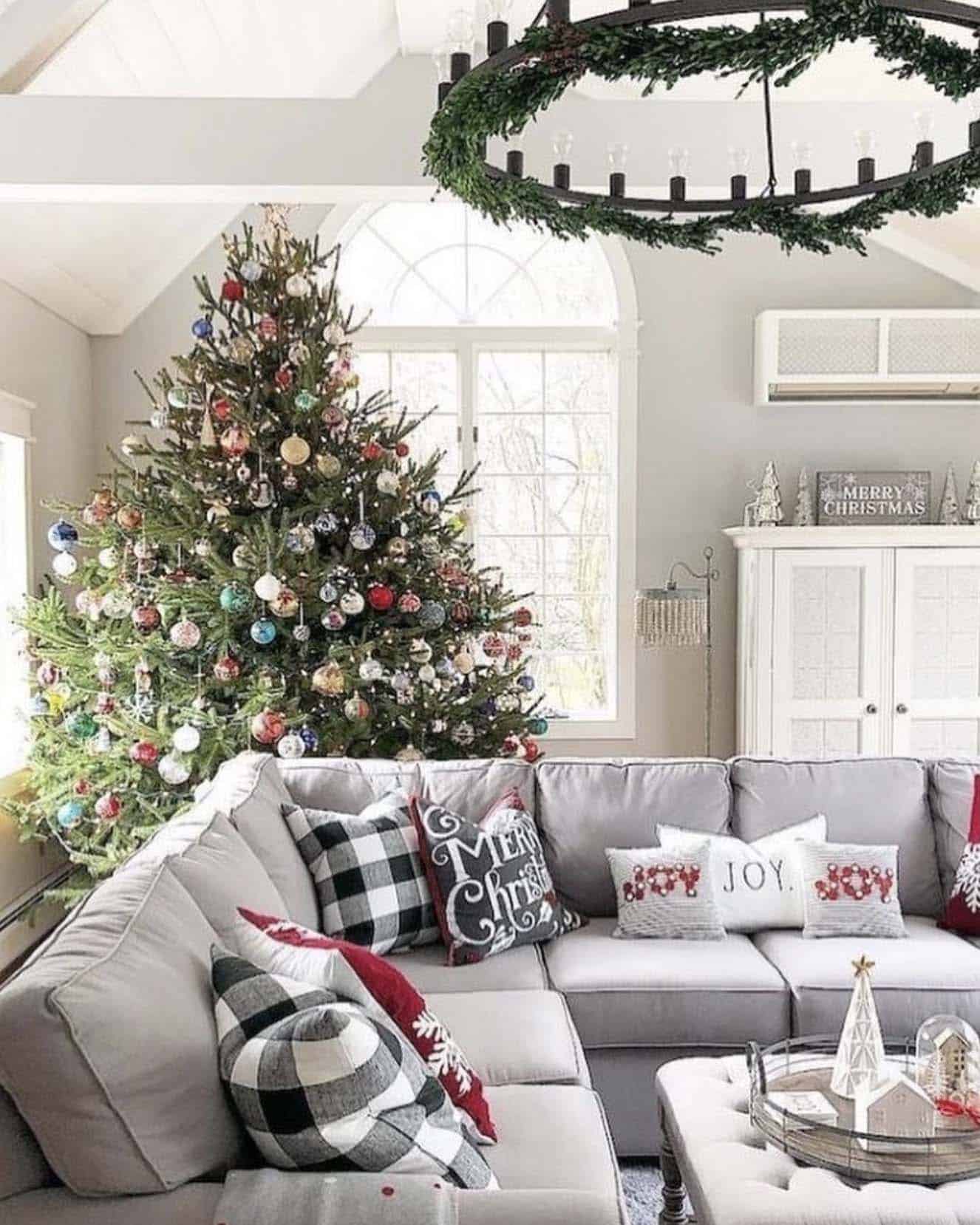 living room decorated with a festive christmas tree