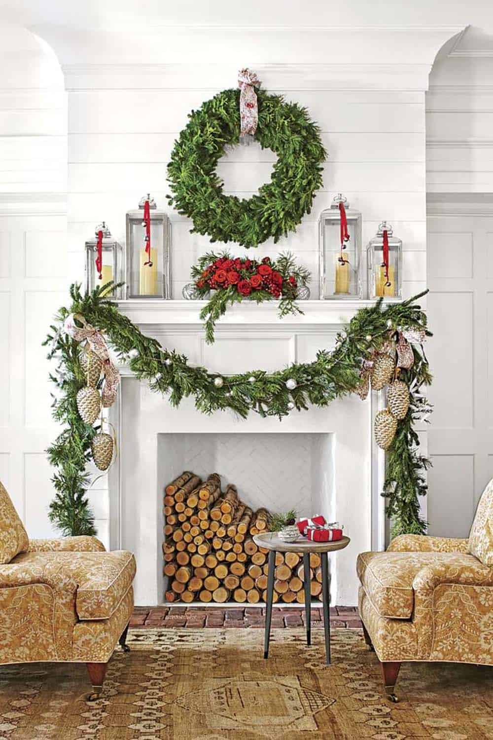 fireplace mantel with garland and a wreath