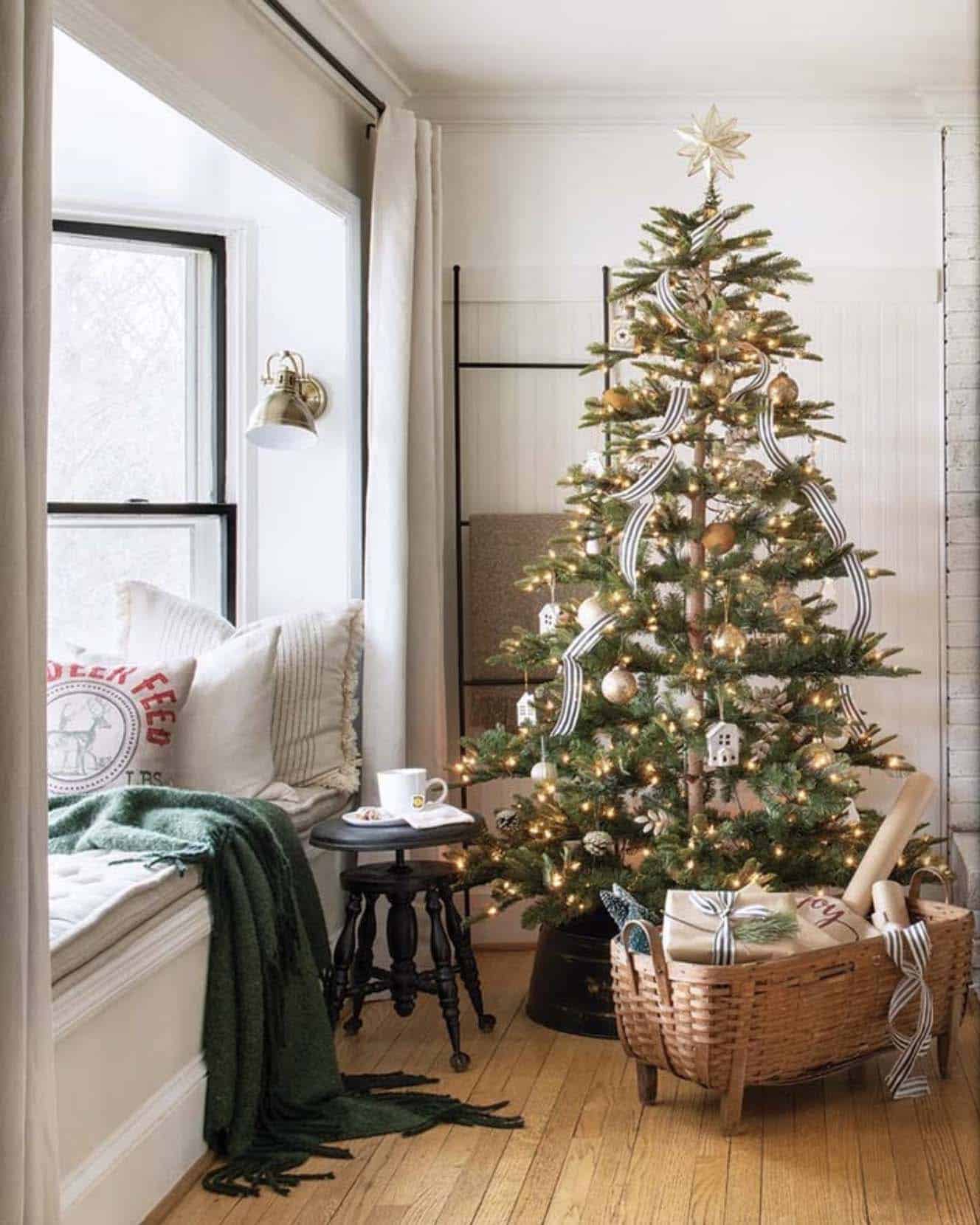 living room decorated with warm and cozy christmas decorations and a tree