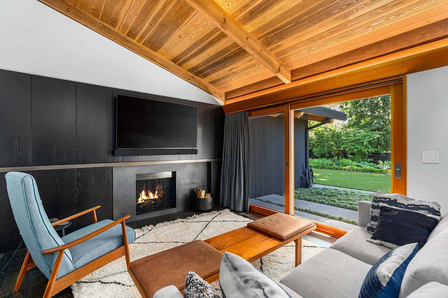 mid-century modern living room with a fireplace