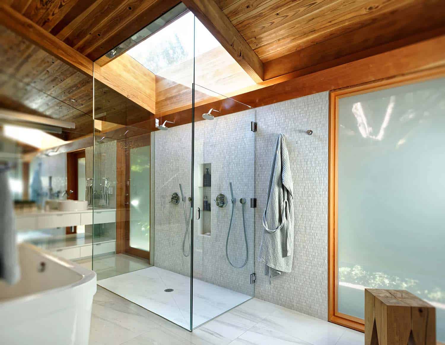 mid-century modern bathroom shower with a skylight