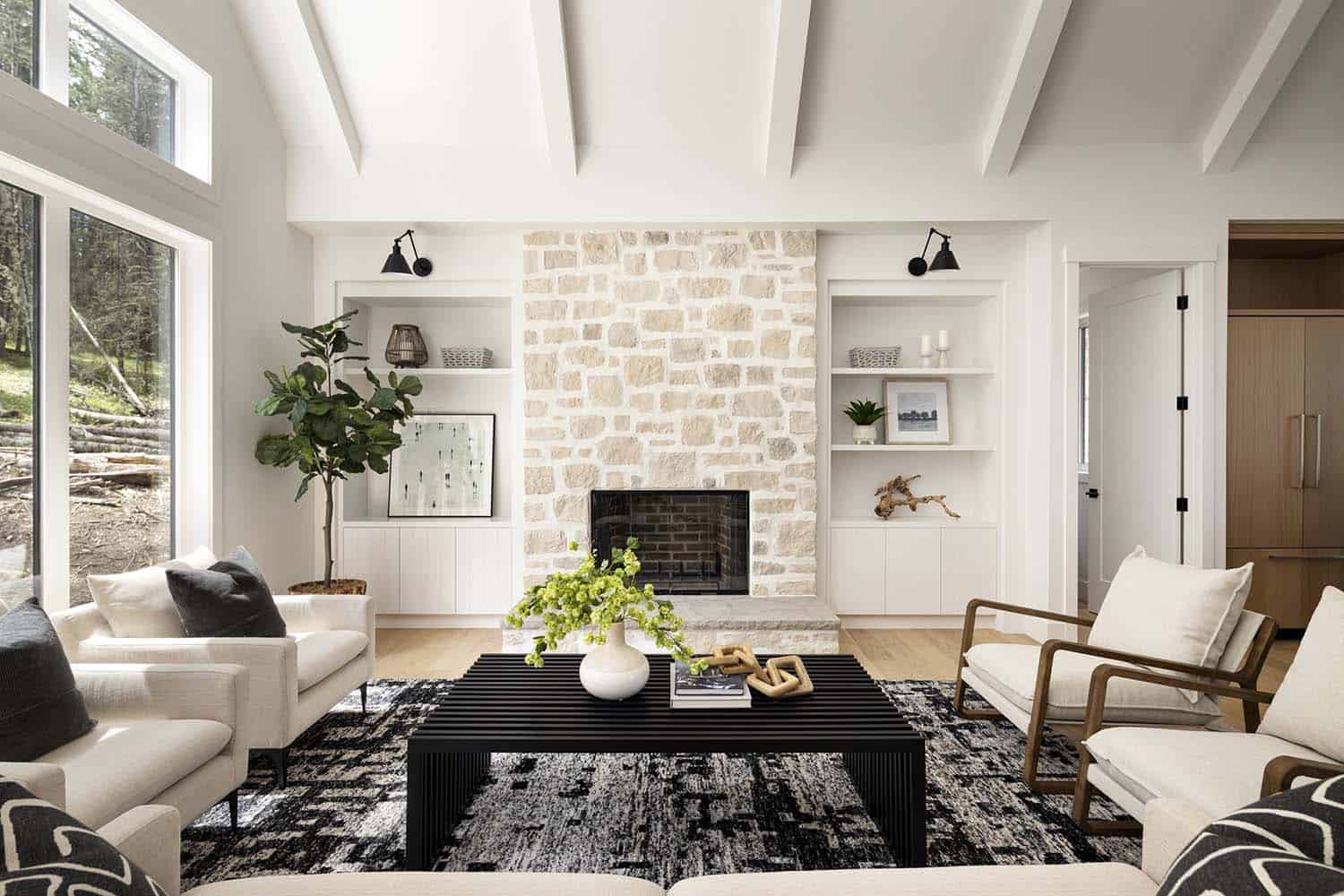 modern farmhouse living room with a stone fireplace