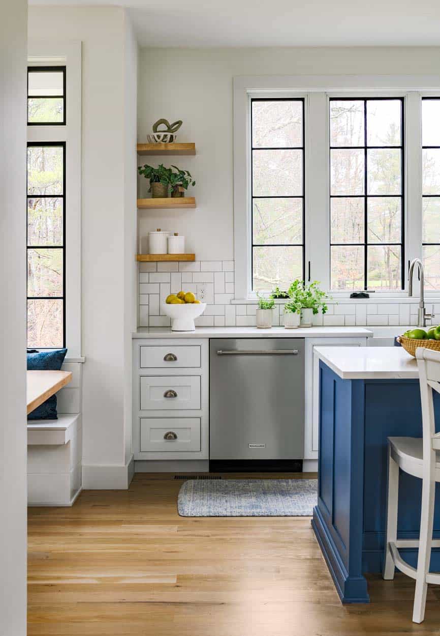 modern farmhouse kitchen with a painted blue island