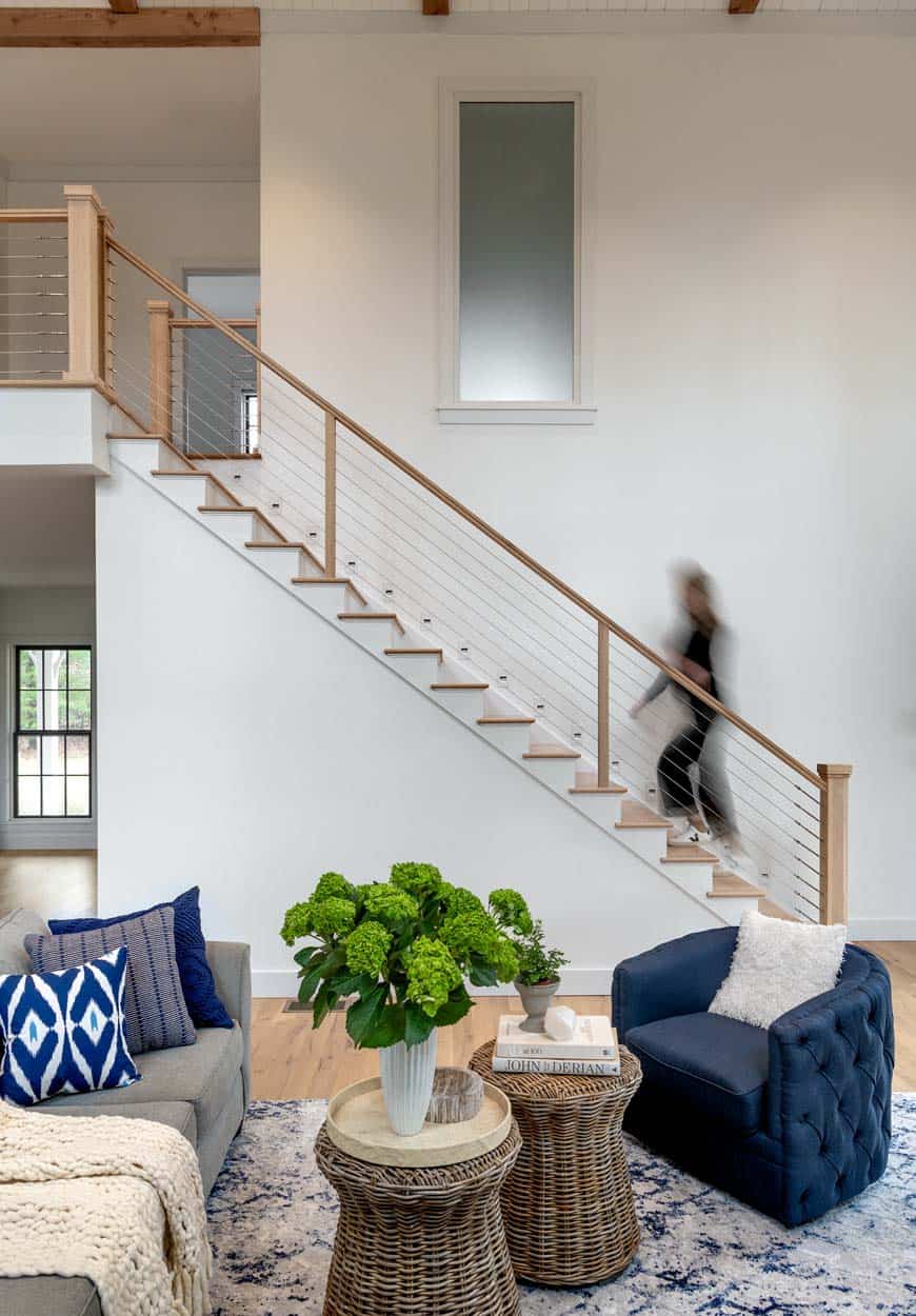modern farmhouse living room with a staircase