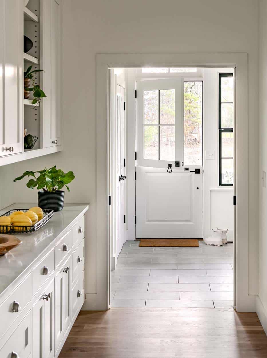 modern farmhouse kitchen pantry leading to the mudroom back door