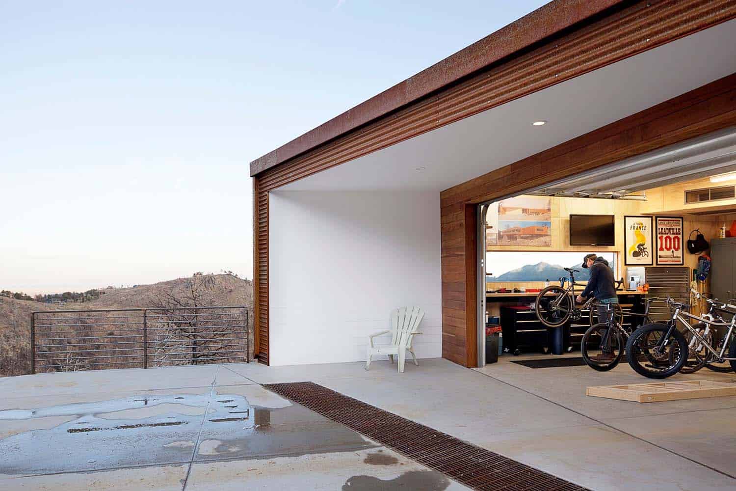 modern hillside home garage exterior