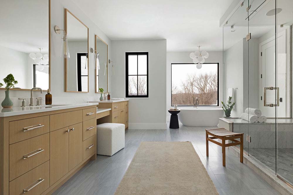 modern bathroom with a vanity and freestanding tub