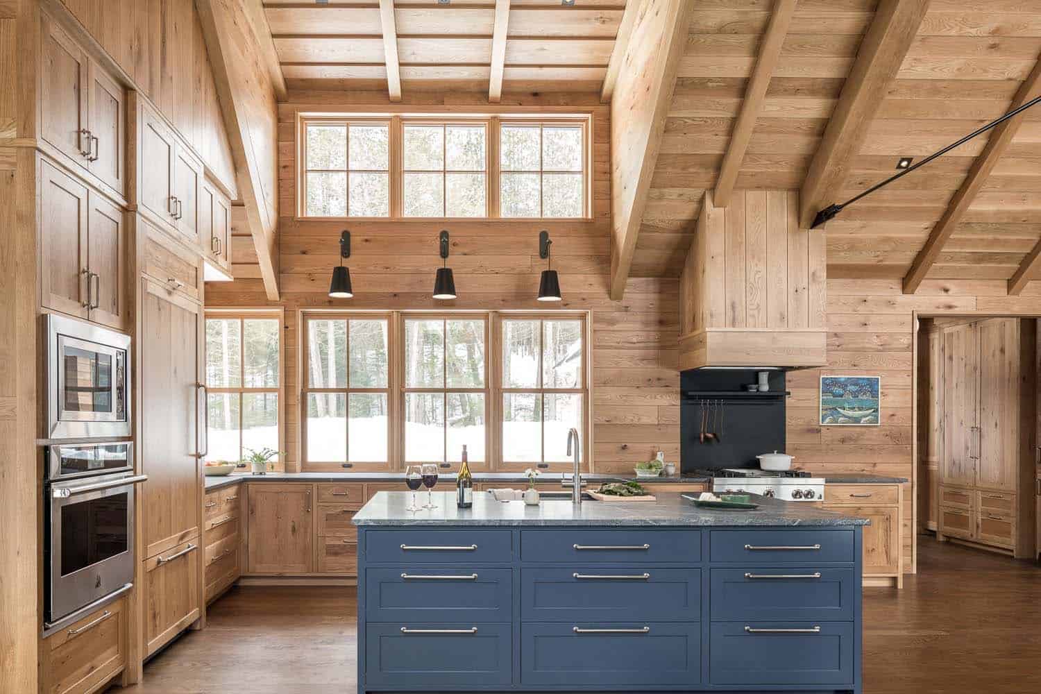 modern rustic kitchen with a blue painted island