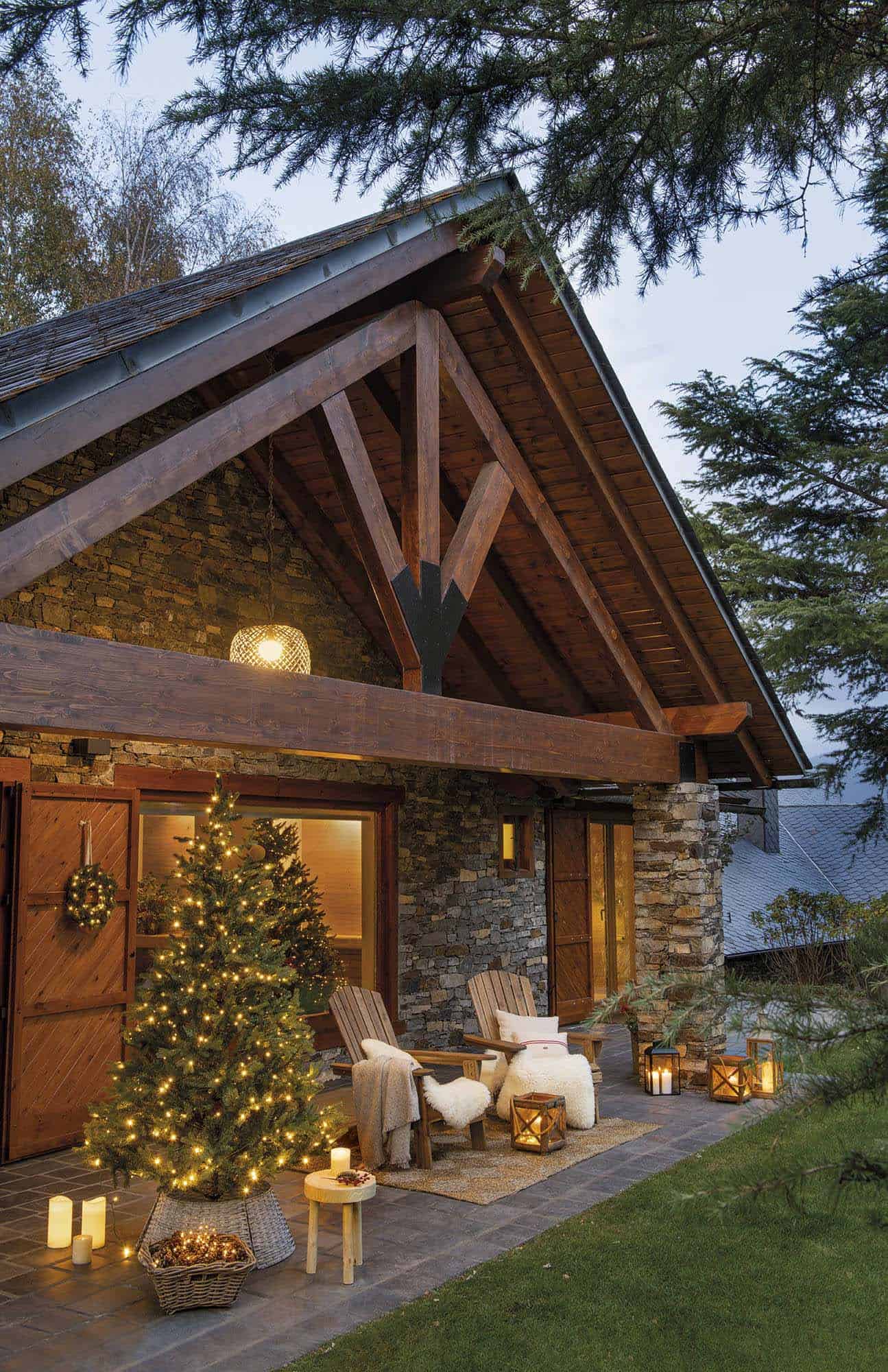rustic cabin exterior with christmas trees