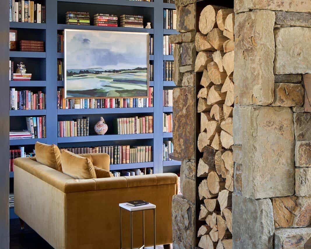 rustic home library with wood storage wall