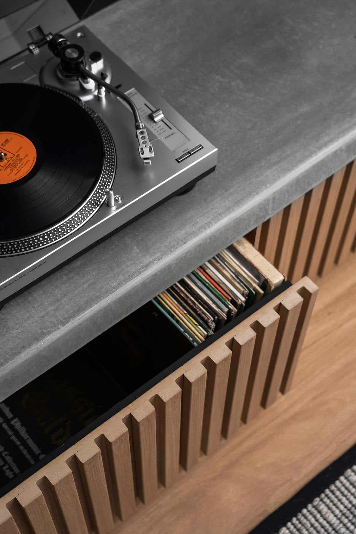 Scandinavian style living room entertainment console detail with a record player