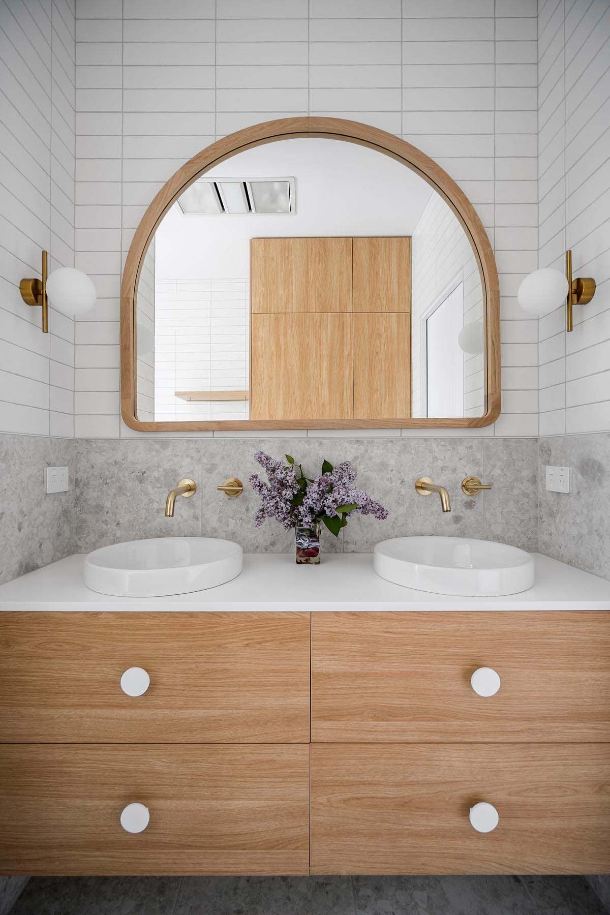 Scandinavian style bathroom vanity with a dual sink