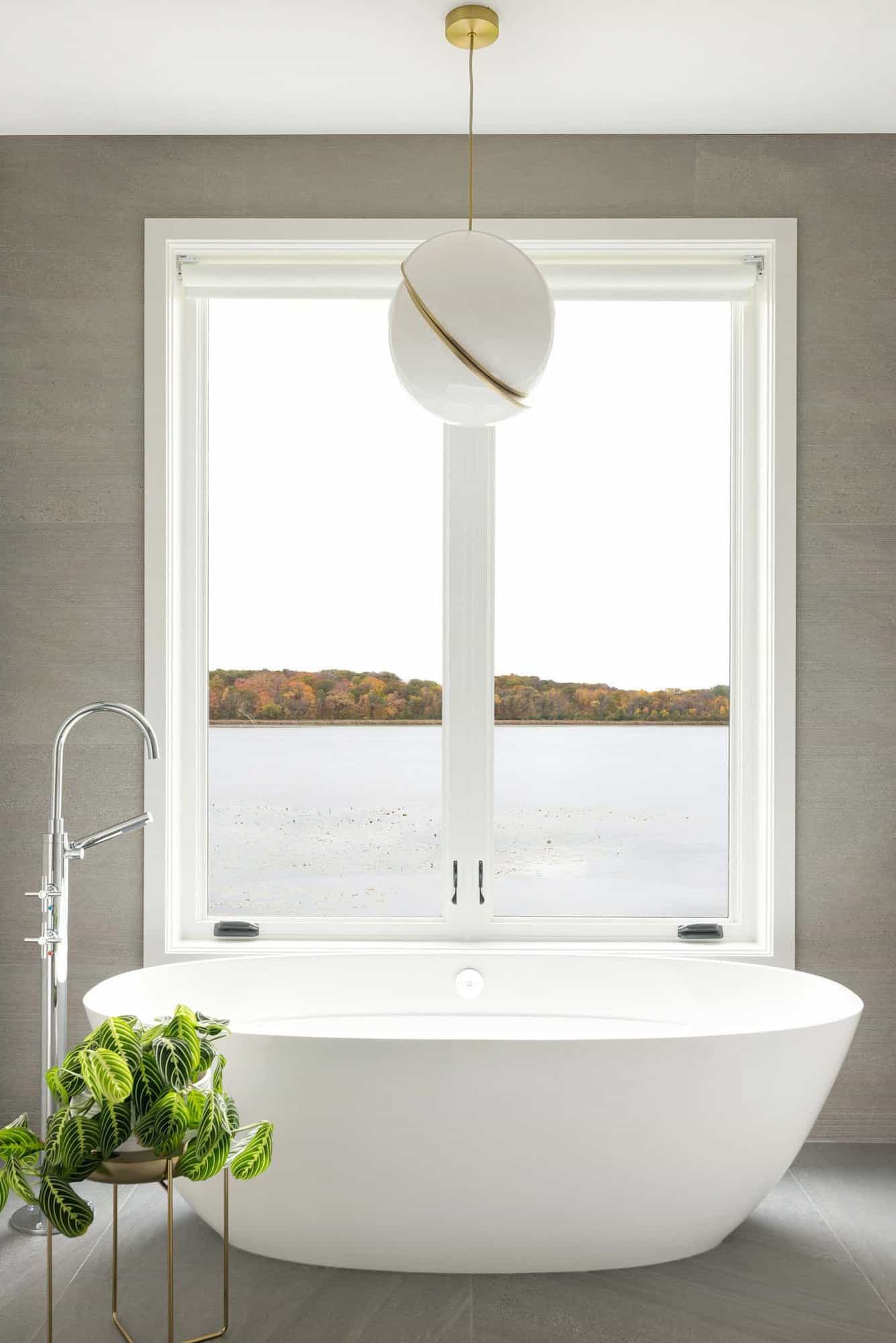Scandinavian midcentury modern bathroom with a freestanding tub