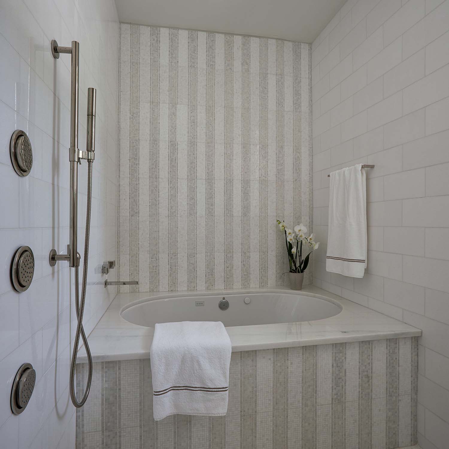 coastal style bathroom shower and integrated tub