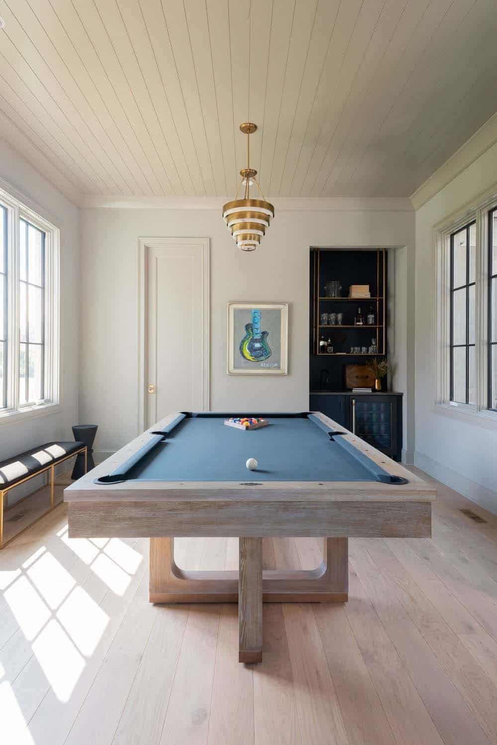 contemporary entertainment room with a pool table