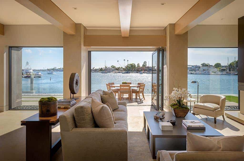 contemporary living room with a water view