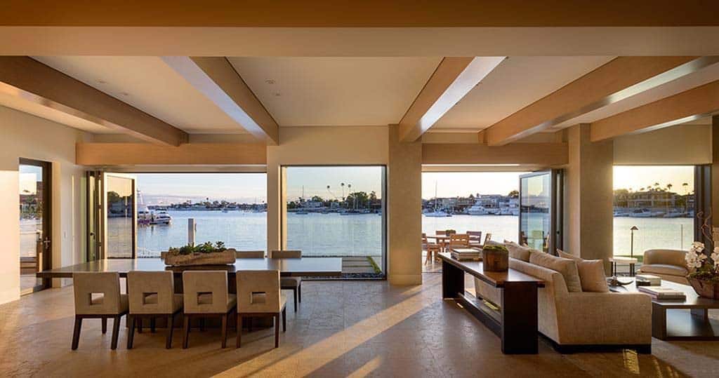 contemporary great room with a water view