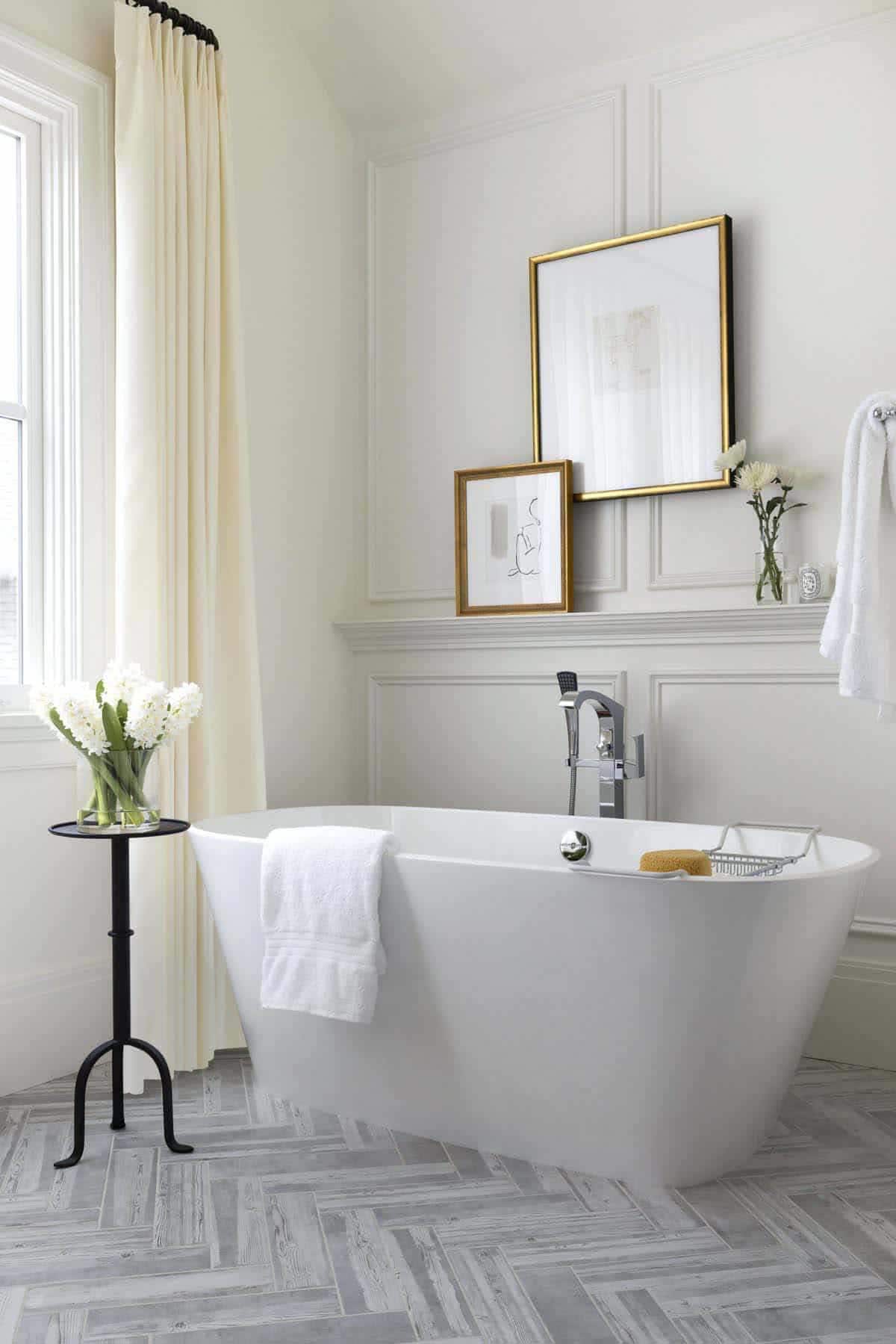 elegant European-influence bathroom with a freestanding tub
