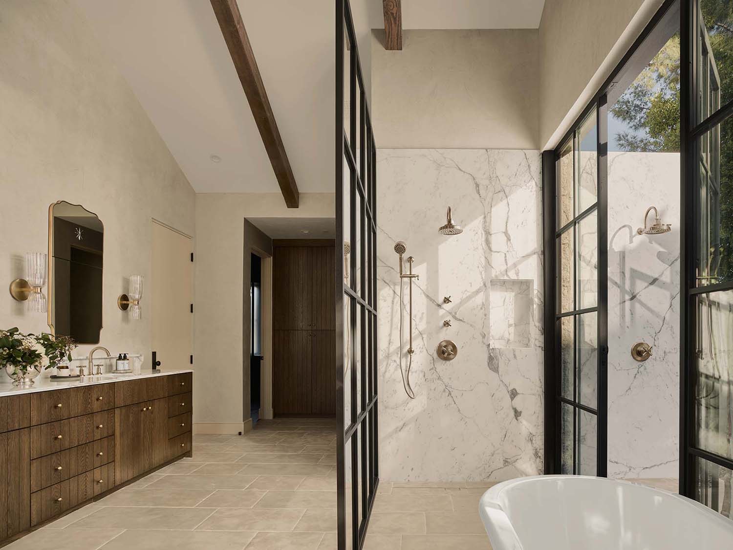 modern bathroom with a shower and freestanding tub 