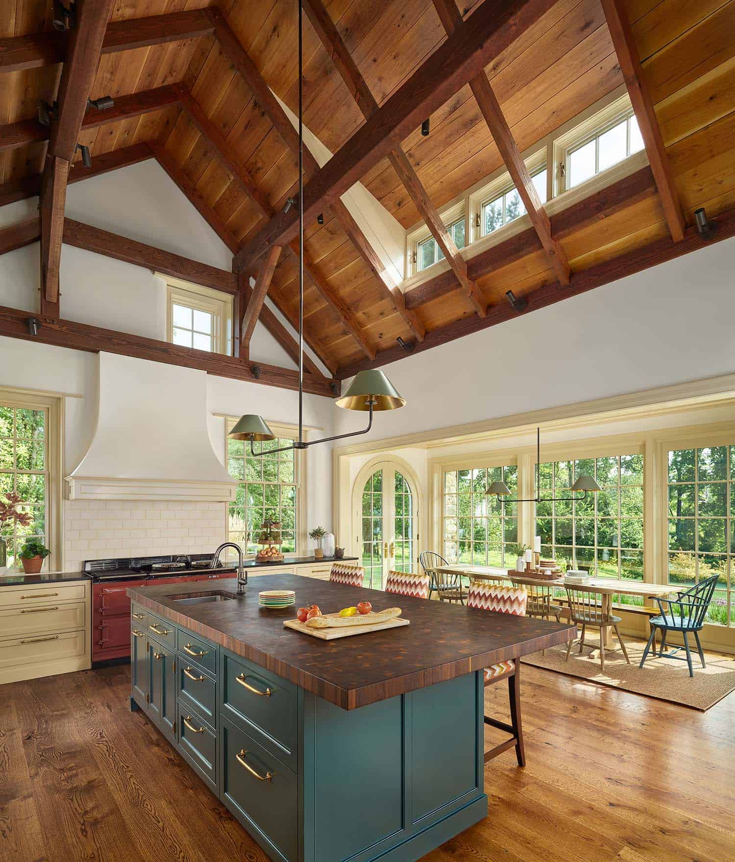 farmhouse kitchen with tall ceilings and clerestory windows