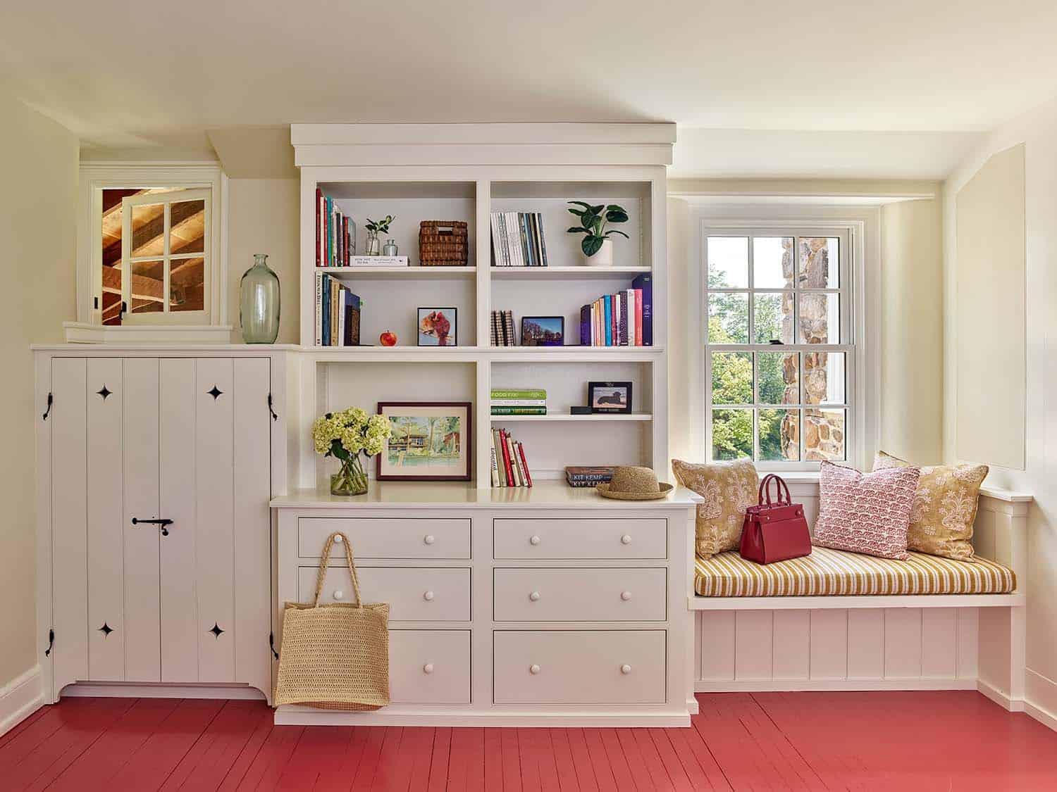 farmhouse window nook with a built-in cabinet