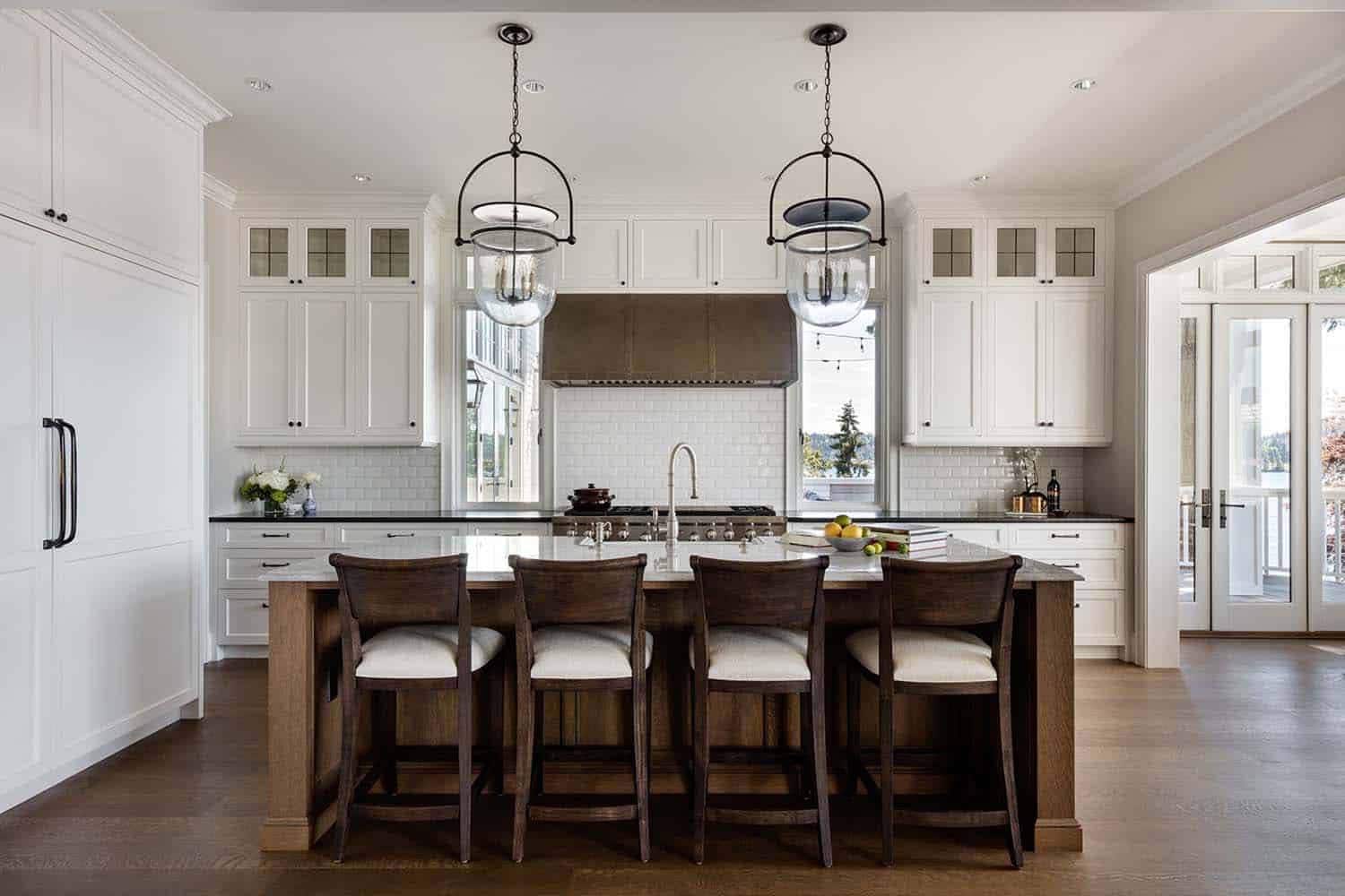 contemporary kitchen with large pendant lights over the island