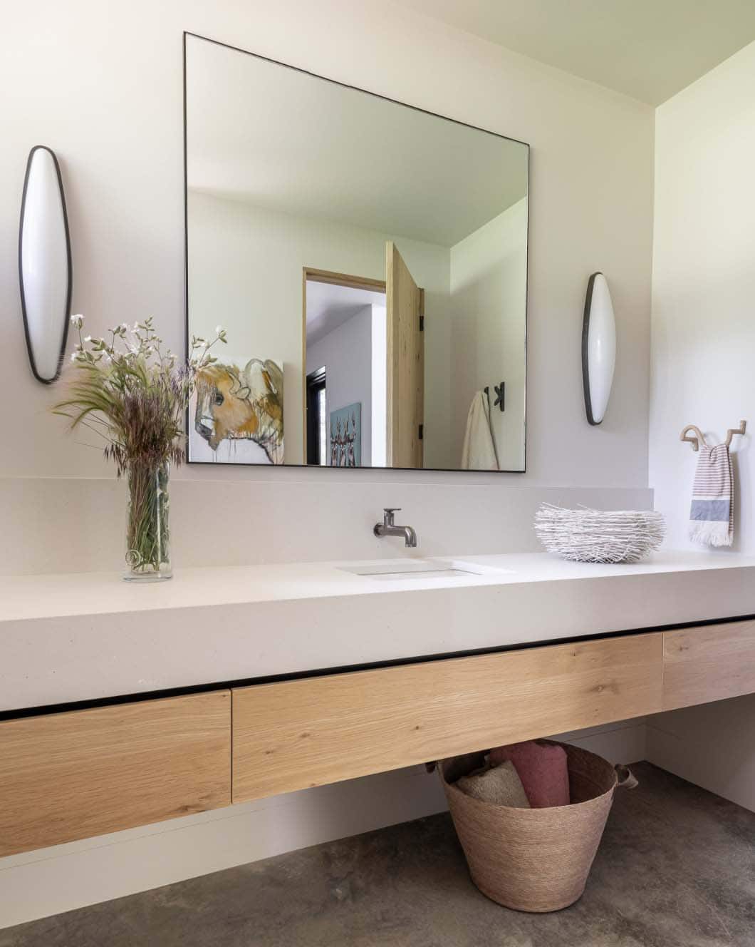 modern bathroom with a floating vanity