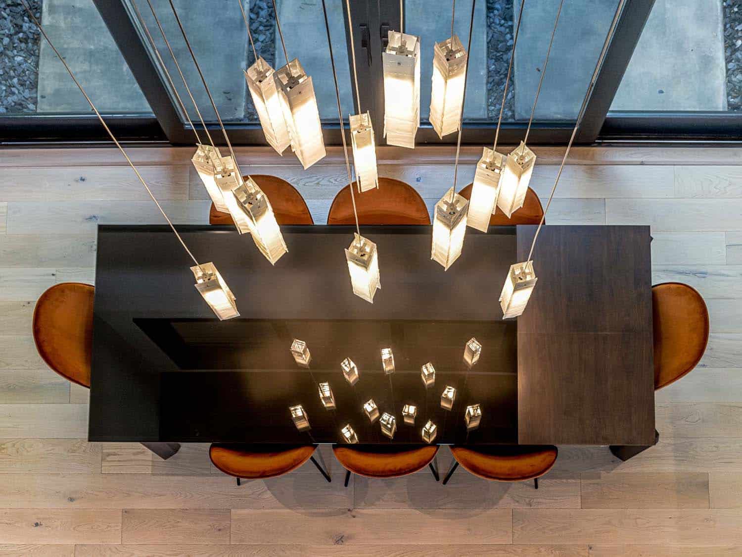 modern chandelier over the dining room