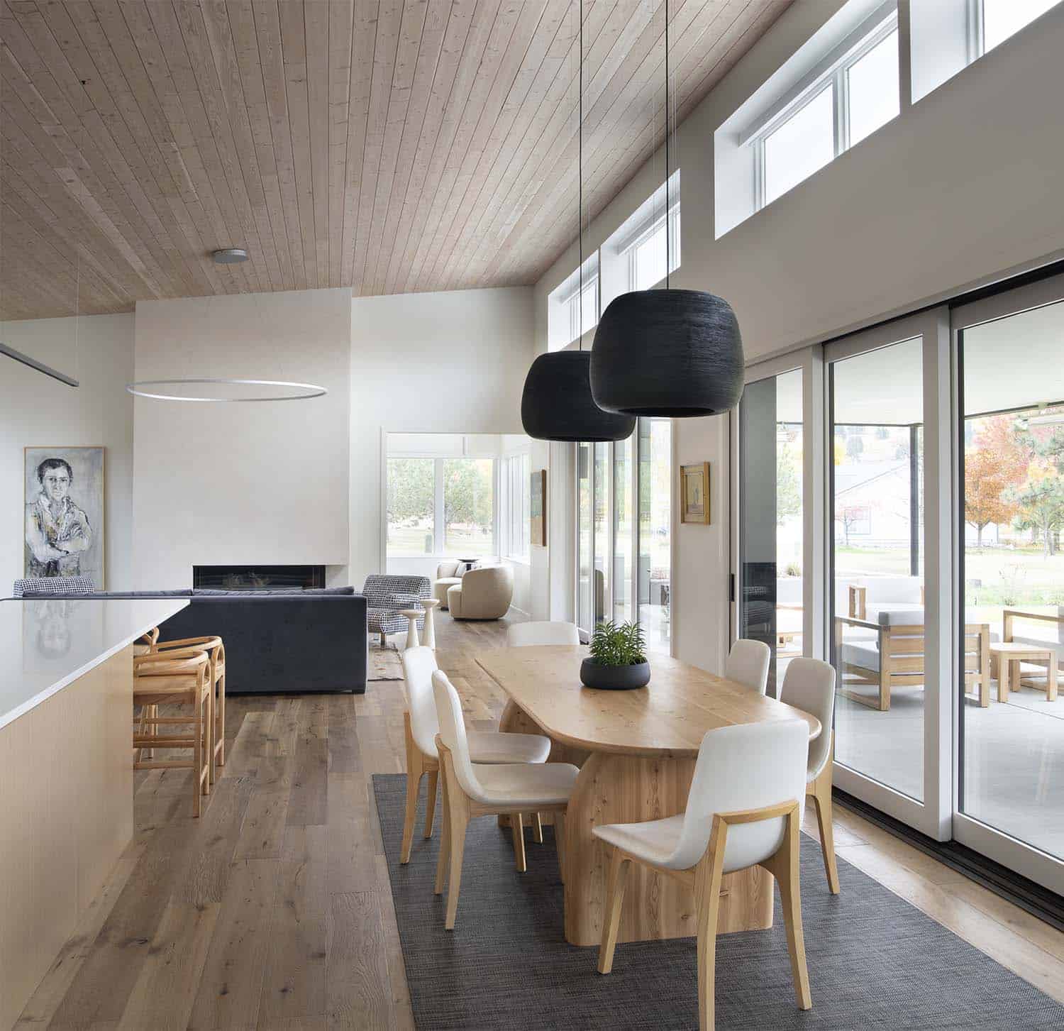 minimalist dining room with large windows