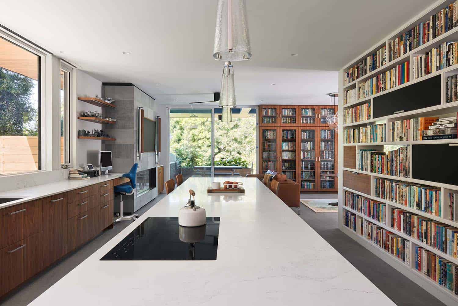 modern kitchen with a bookshelf