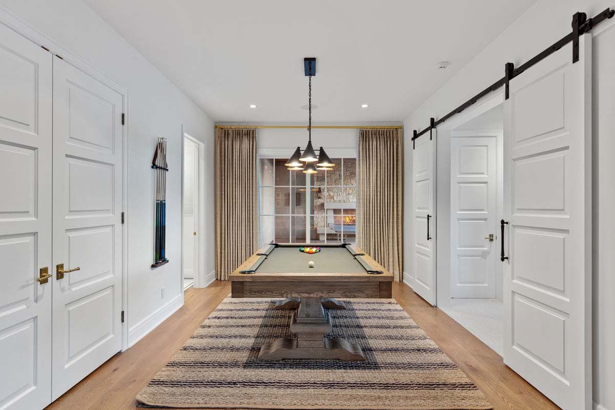 modern entertainment room with a pool table