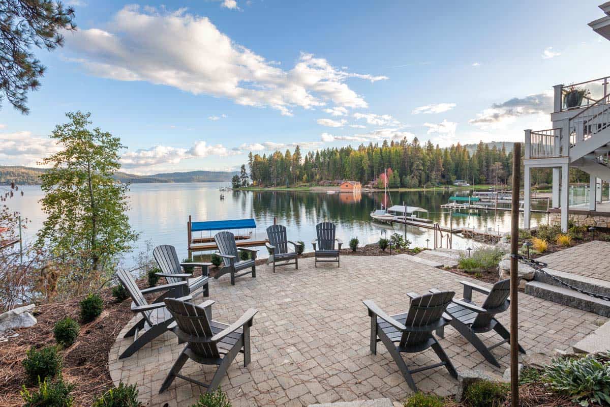 modern lake house patio with Adirondack chairs