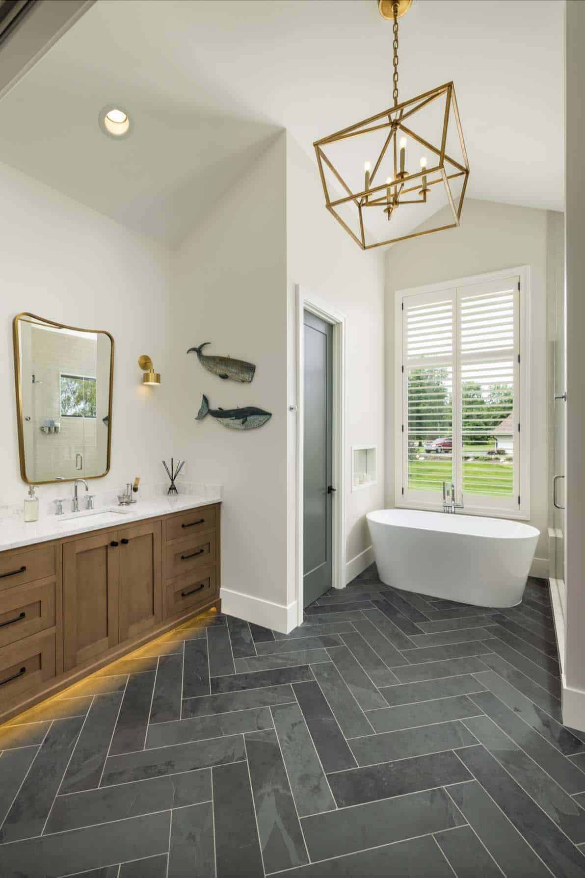 modern farmhouse style bathroom with a vanity and freestanding tub