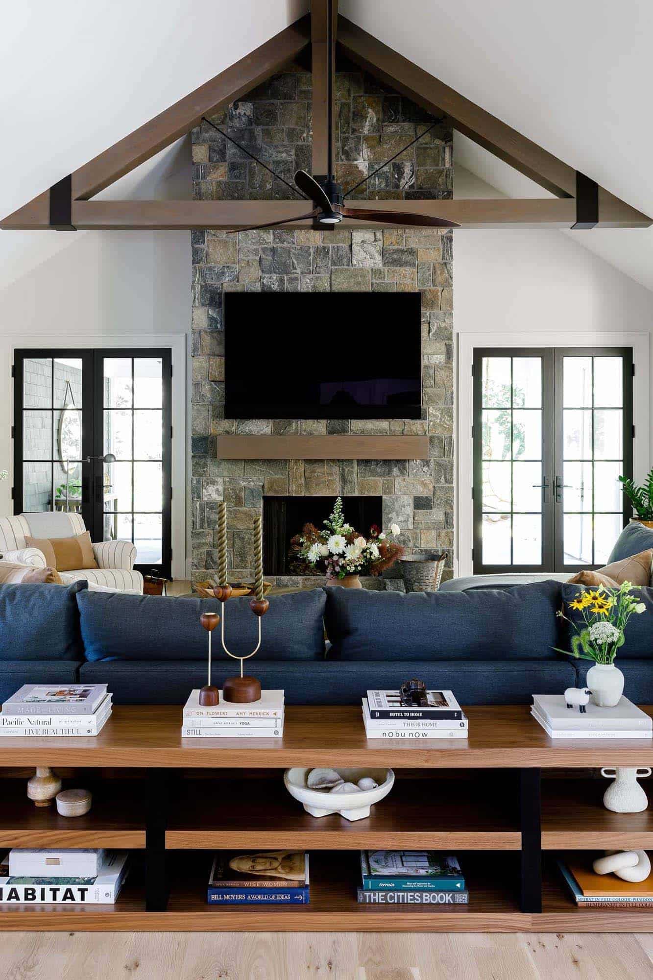 modern living room with a stone fireplace