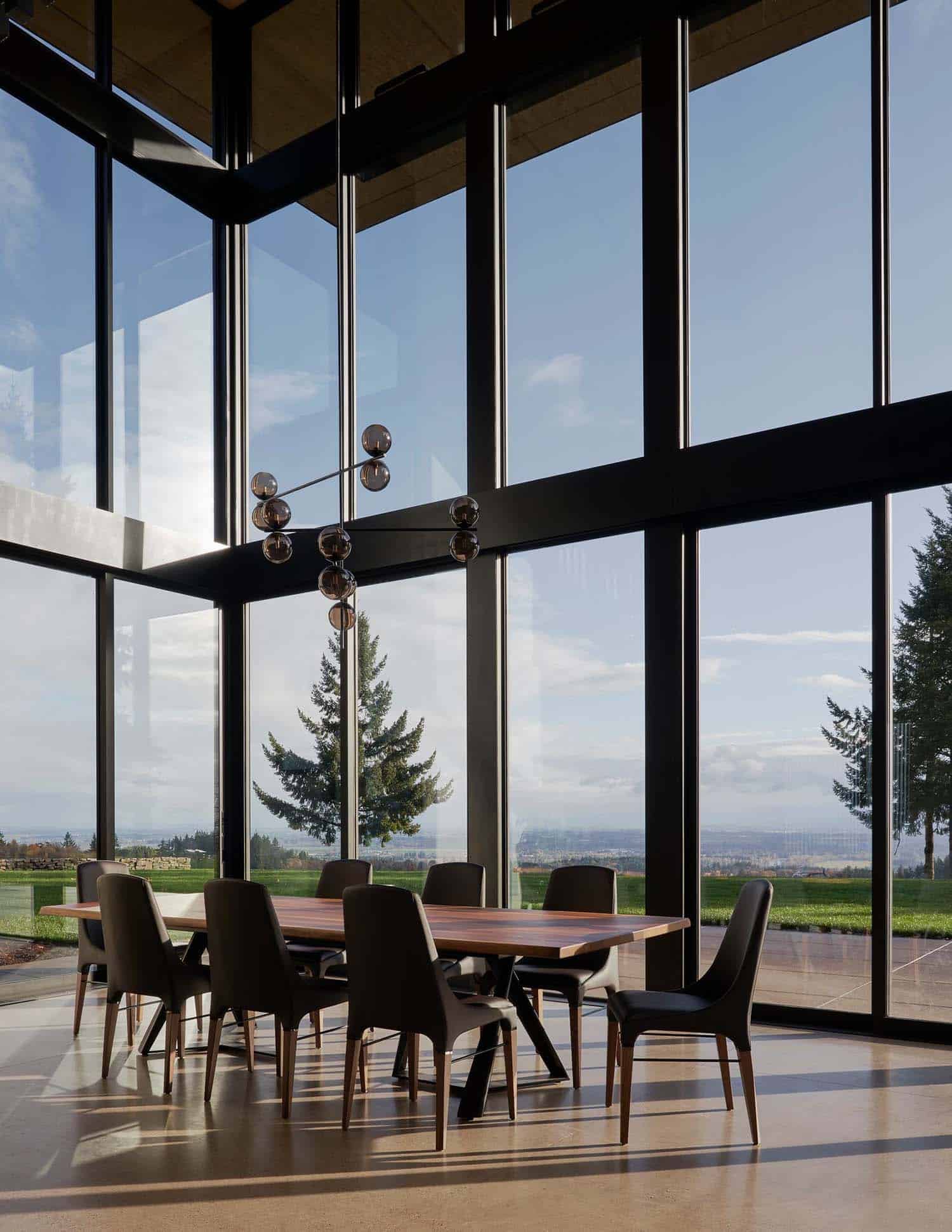 modern dining room with floor-to-ceiling windows
