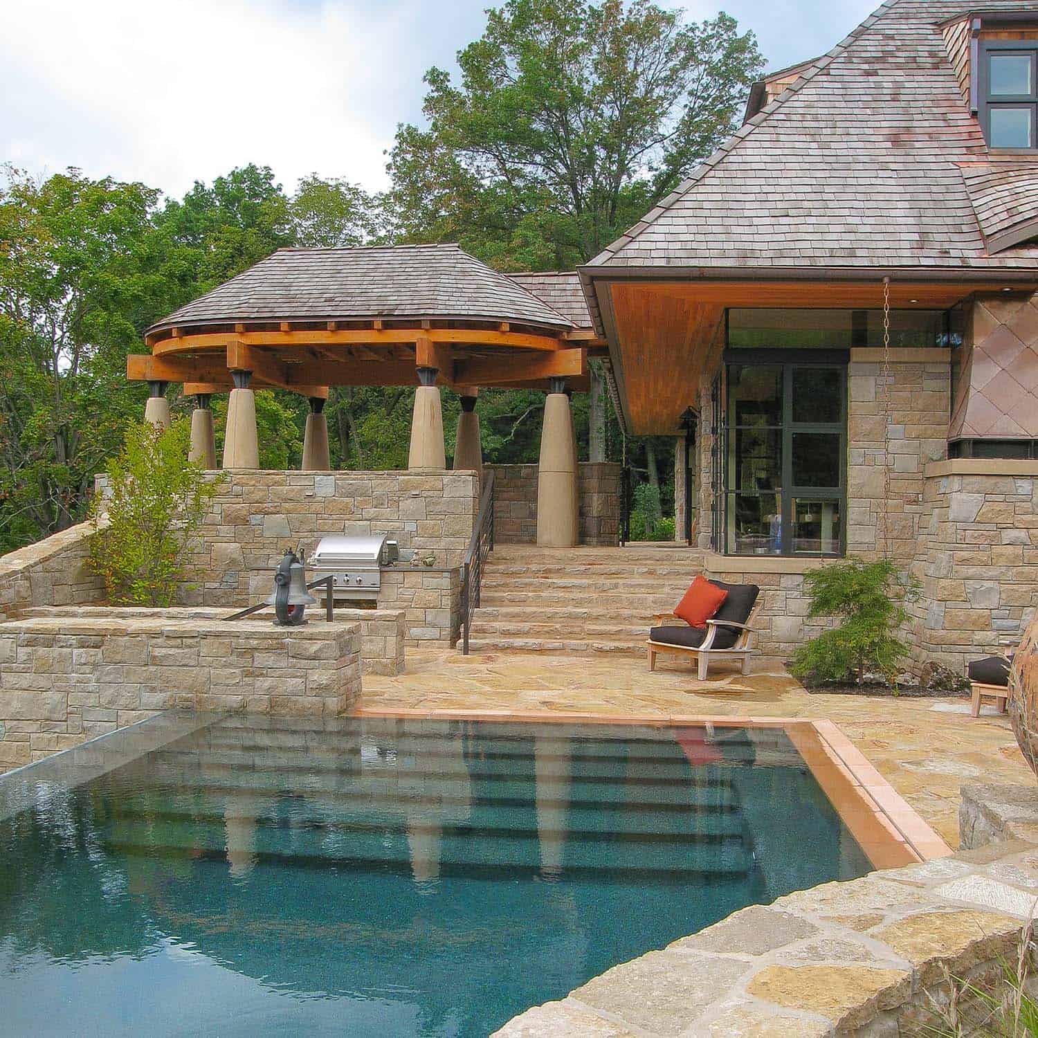 modern cottage exterior with a pool