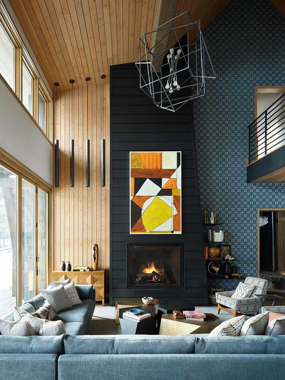 modern living room with a fireplace and large artwork