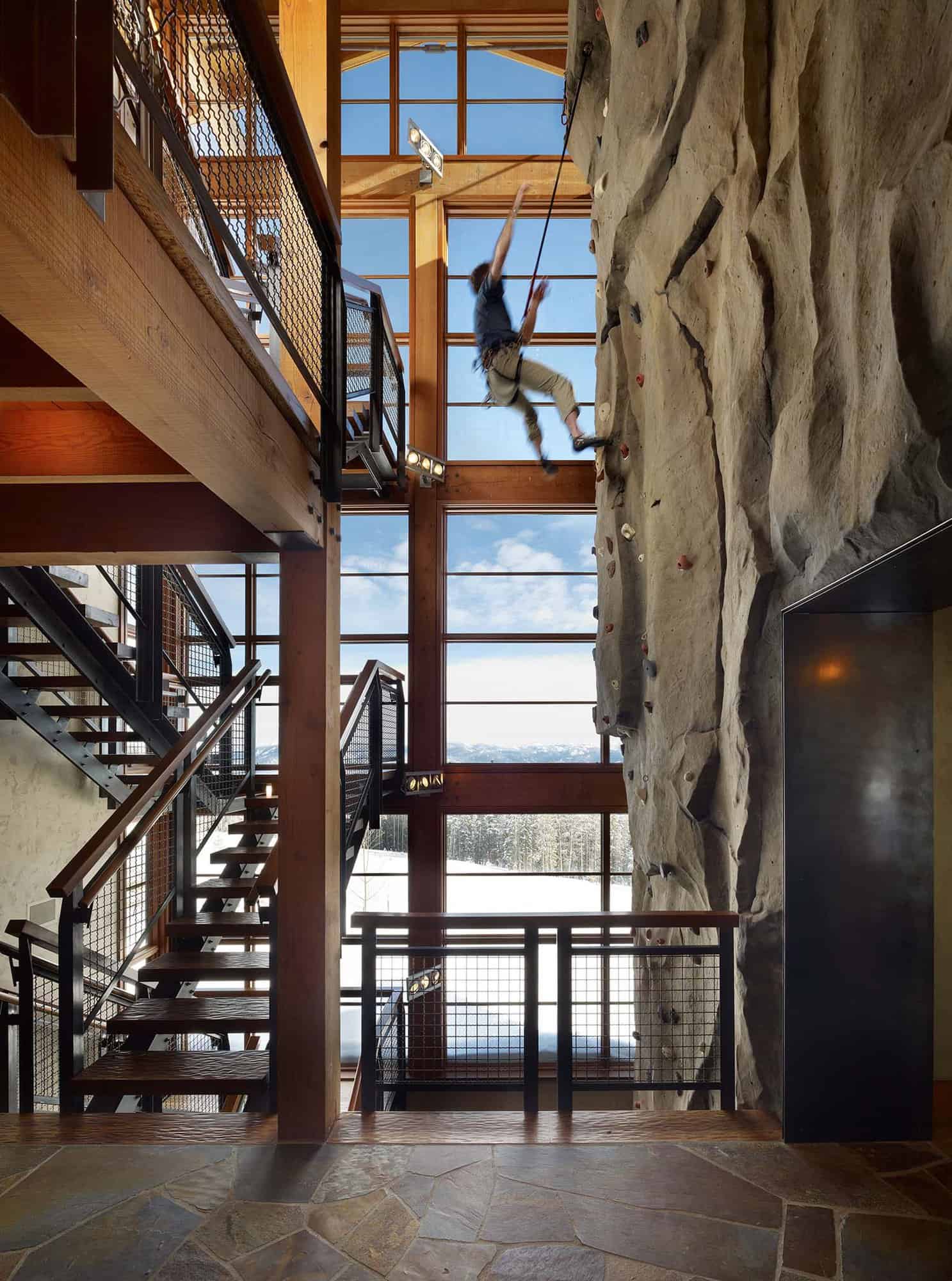 modern rustic staircase and rock climbing wall